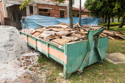 Professional garden clearance team at work in Belsize Park