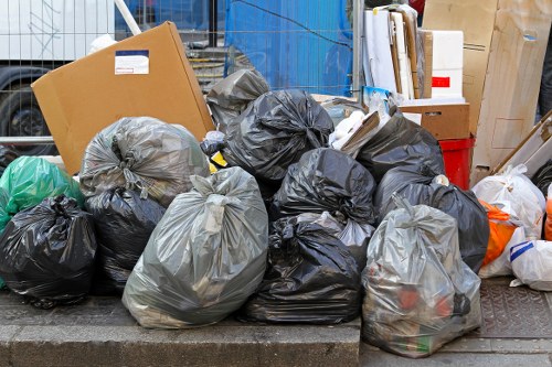 Furniture disposal trucks in Belsize Park